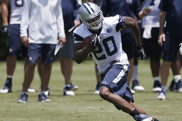 In this Wednesday, May 27, 2015 file photo, Dallas Cowboys running back Darren McFadden runs a play during an NFL football organized team activity in Irving, Texas. (AP Photo/Brandon Wade, File)