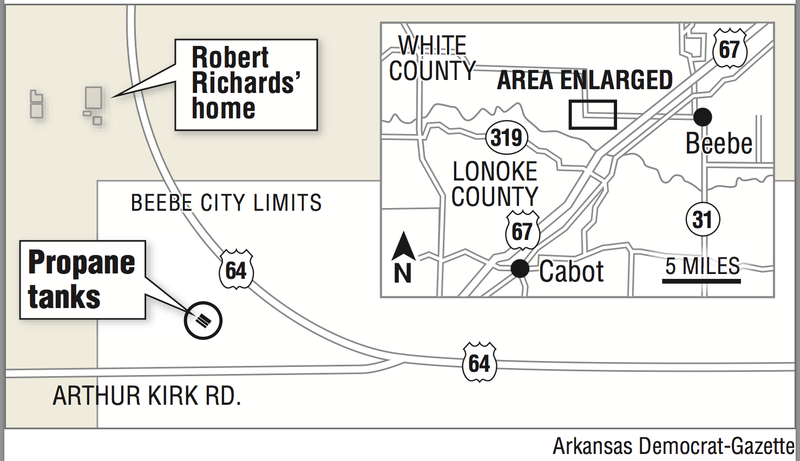 A graphic shows the location of three propane storage tanks on a curve of U.S. 64 and their proximity to the home of Robert Richards.