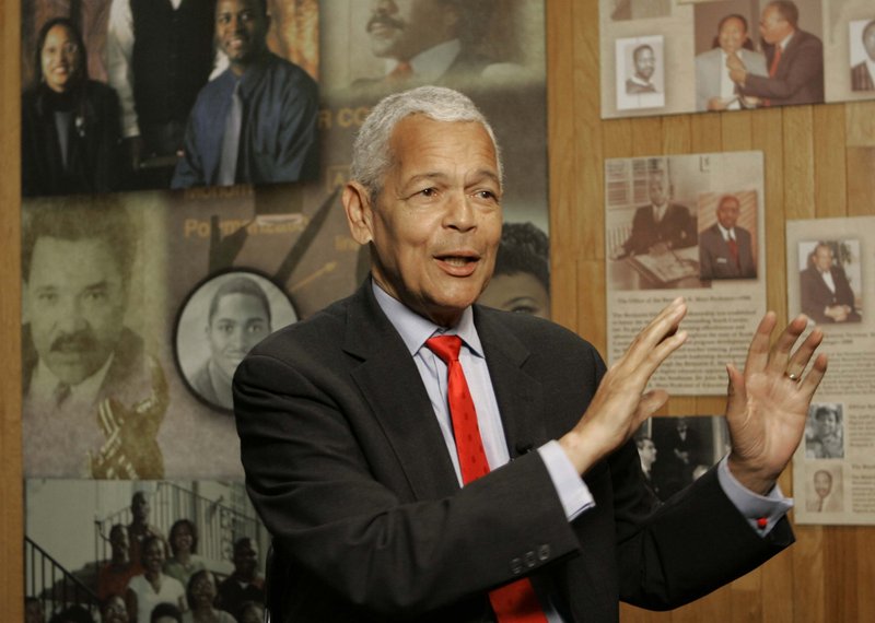 In this Oct. 13, 2006, file photo, Julian Bond, chairman of the Board for The National Association for the Advancement of Colored People, gestures as he talk to the media about the organization at The University of South Carolina in Columbia, S.C. Bond, a civil rights activist and longtime board chairman of the NAACP, died Saturday, Aug. 15, 2015, according to the Southern Poverty Law Center. He was 75. 