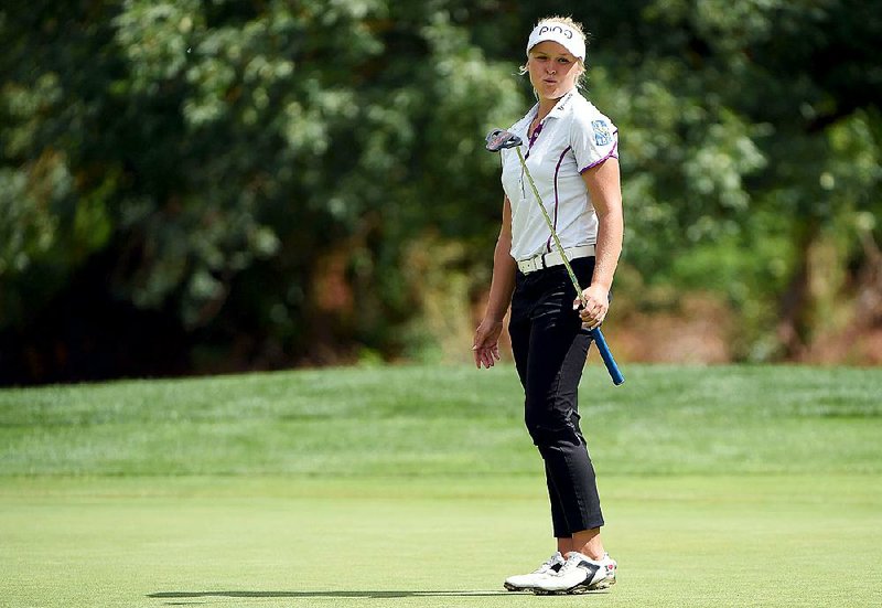 Brooke M. Henderson of Canada reacts to missing a birdie putt on the fourth hole Saturday during the third round of the LPGA Cambia Portland golf tournament in Portland, Ore.