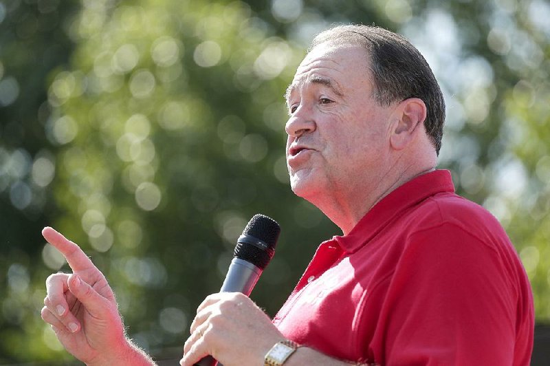 Republican presidential candidate Mike Huckabee speaks at the Iowa State Fair on Thursday. The former Arkansas governor participated in the Des Moines Register’s Political Soapbox during his appearance. 