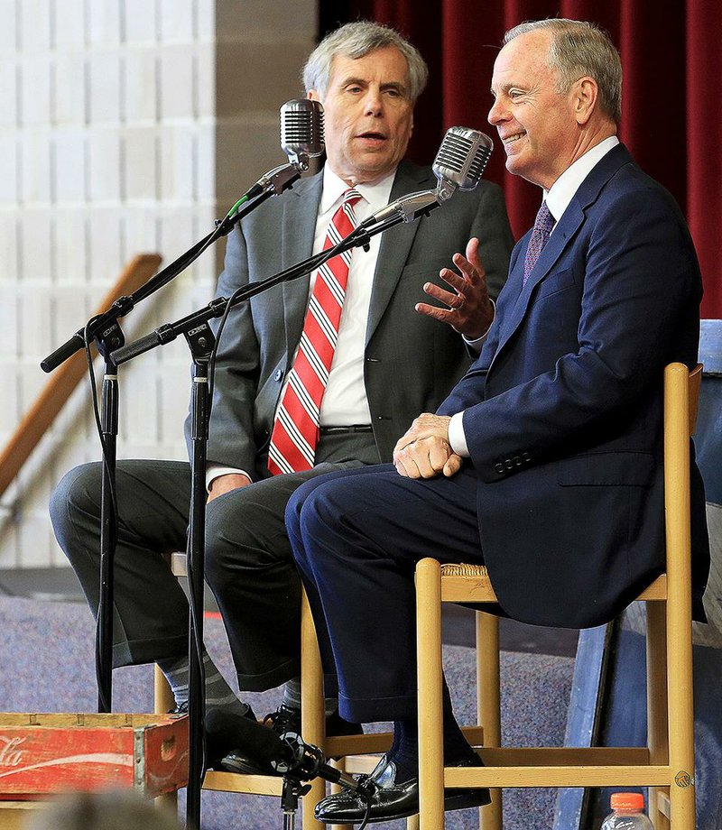 Skip Rutherford (left) and Mack McLarty swap stories on the radio show "Tales from the South" about their lives during the years of the Clinton presidency Sunday at Pulaski Heights United Methodist Church in Little Rock.