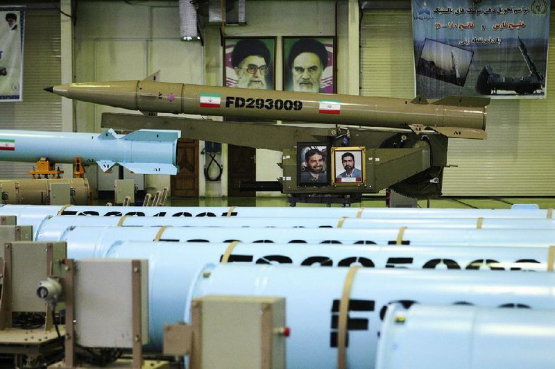 This March 2014 photo from the Iranian Defense Ministry purportedly shows two types of ballistic missiles at an undisclosed location in Iran. 