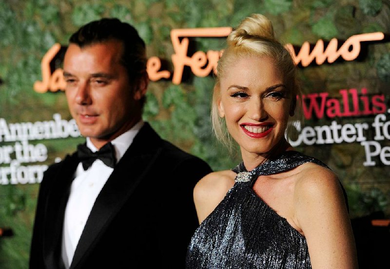 Gwen Stefani (right) filed for divorce from Gavin Rossdale, citing irreconcilable differences. The two are shown in Beverly Hills, Calif., in this October 2013 file photo.