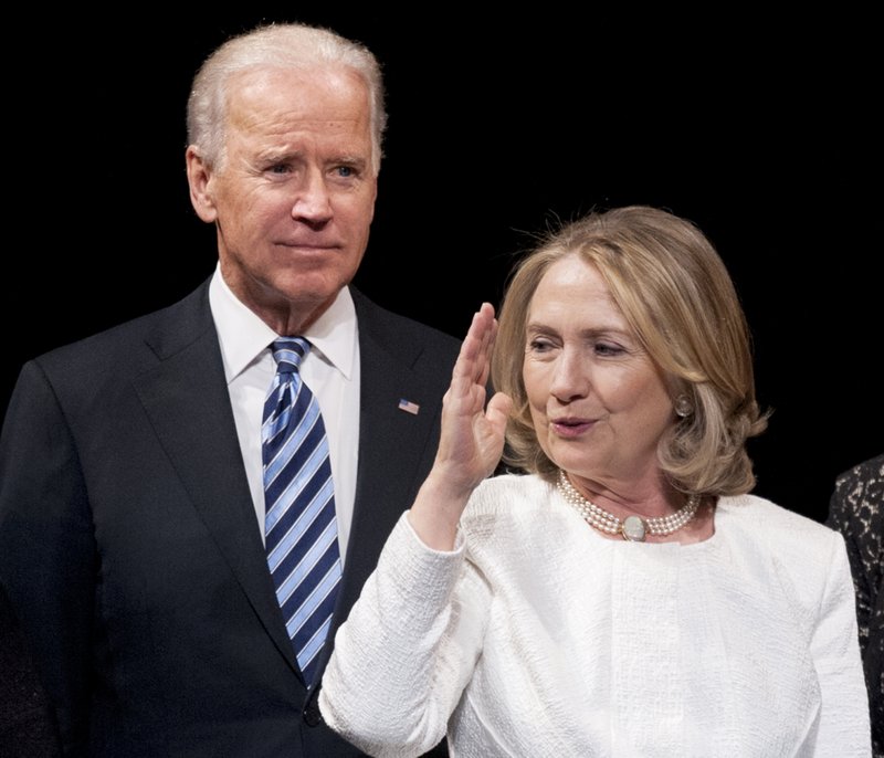 Vice President Joe Biden and former Secretary of State Hillary Rodham Clinton appear onstage at the Kennedy Center for the Performing Arts in Washington in this April 2013 file photo.