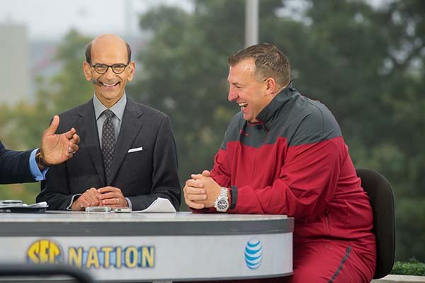 Arkansas coach Bret Bielema, right, and SEC Network host Paul Finebaum laugh during an episode of "SEC Nation" on Saturday, Oct. 11, 2014, in Fayetteville. 