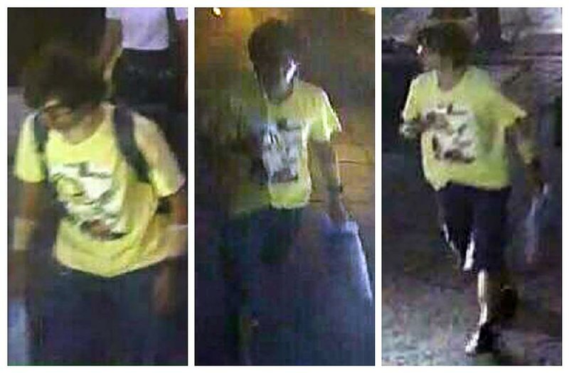 This image released by the Royal Thai Police shows a man wearing wearing a backpack, which is left behind near the Erawan Shrine before an explosion Monday night in Bangkok. Police label the man a suspect in the blast, which killed a number of people at the downtown shrine.