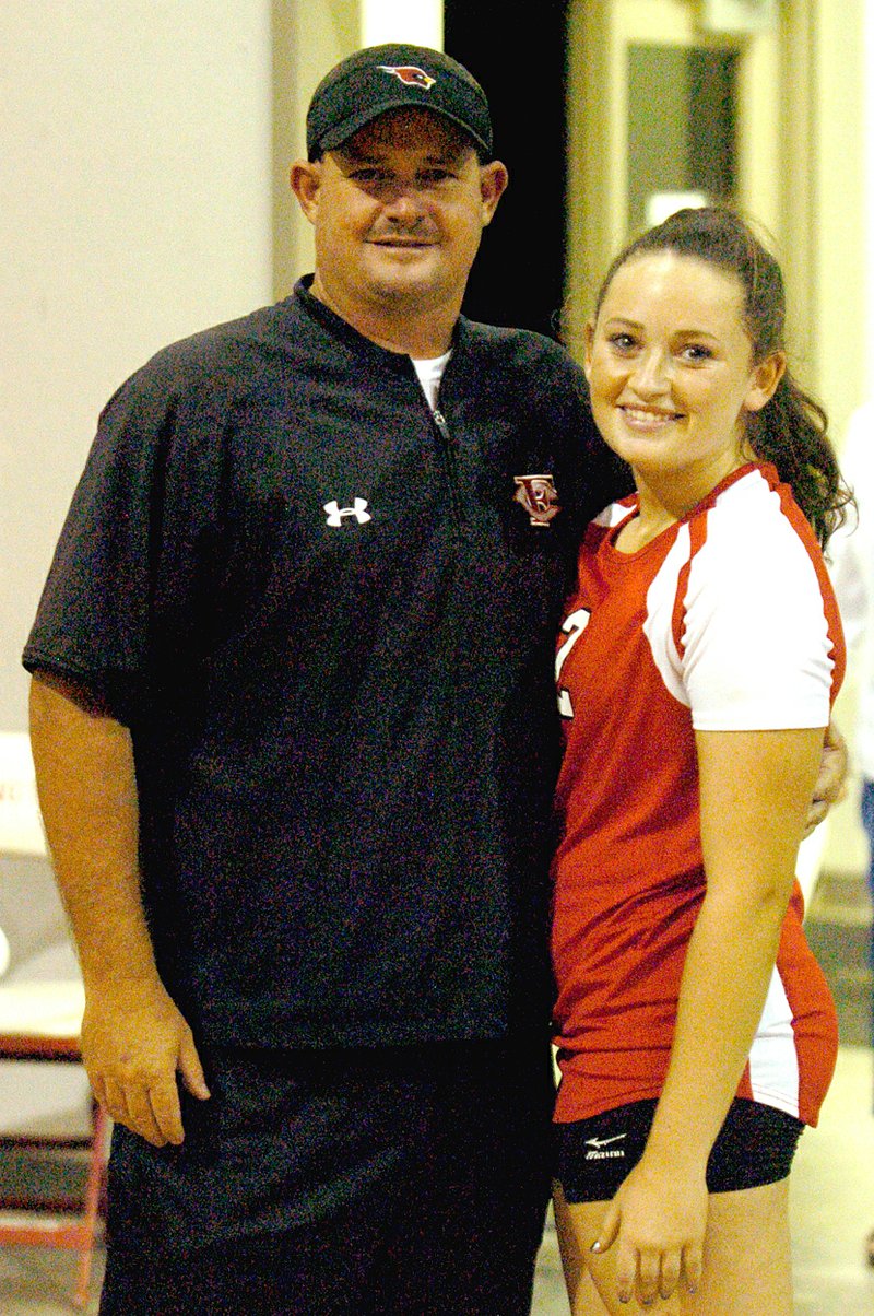 MARK HUMPHREY ENTERPRISE-LEADER Callie Harper, pictured with her father Farmington head baseball coach and defensive coordinator Jay Harper, has inherited her daddy&#8217;s competitive streak, a factor, which Farmington volleyball coach Marshall Ward will benefit the team with Callie playing setter.