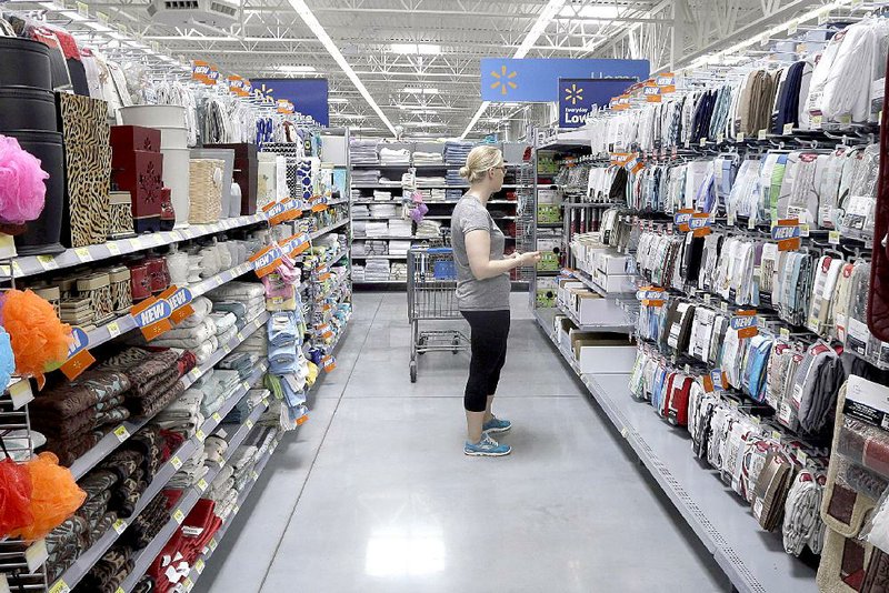 A shopper looks at home accessories at a Wal-Mart Supercenter in Springdale in June. The Labor Department on Wednesday said its measure of retail inflation, the consumer price index, rose 0.1 percent in July.