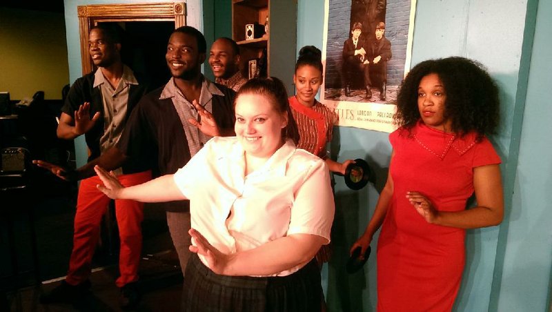 Tracey Turnblad (played by Bethaney Gere, center) and (from left) Micheal Lowe, LaDarius Jamerson, Elijah Ash, Francesca Bee and Dominique Duarte rock Baltimore in Hairspray at Murry’s Dinner Playhouse, 6232 Colonel Glenn Road, through Aug. 29. Tickets are $31-$35, $23 for children 15 and under; $25 and $15 for show only. Call (501) 562-3131.
