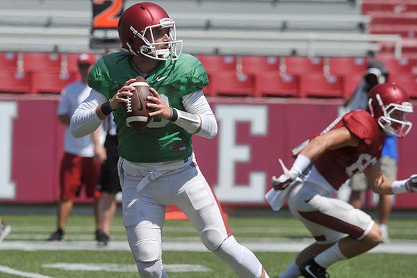 Arkansas quarterback Brandon Allen warms up prior to practice Saturday, Aug. 15, 2015, at Razorback Stadium in Fayetteville.