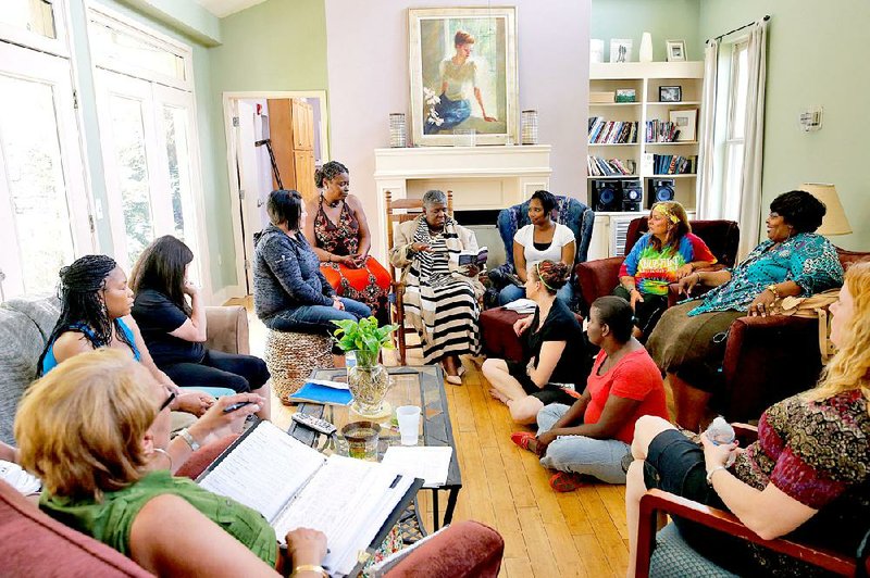 Women gather for discussion at one of Thistle Farms’ residential Magdalene homes in Nashville, Tenn. 