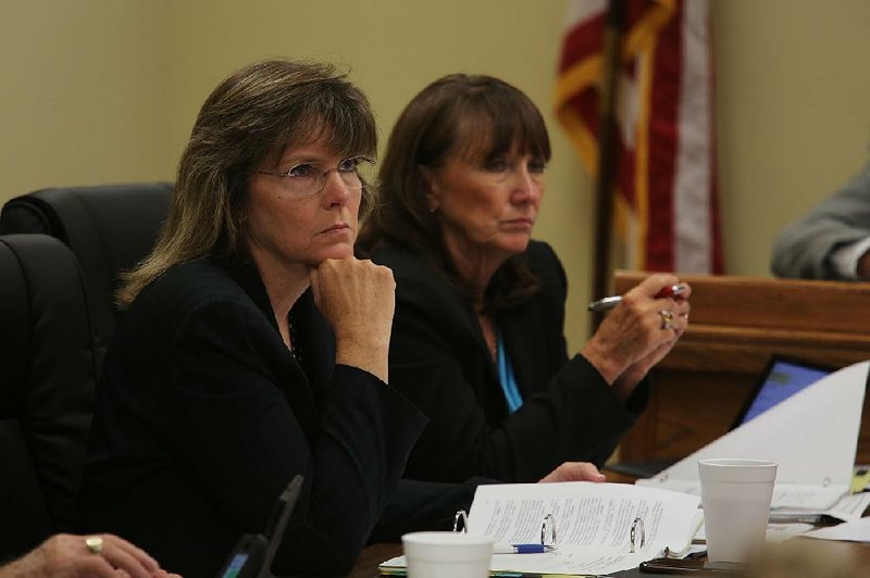 Department of Correction Director Wendy Kelley (left) and Arkansas Department of Community Correction director Sheila Sharp at the Arkansas Board of Corrections meeting Friday afternoon.