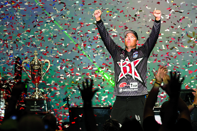 Brad Knight of Lancing, Tenn., celebrates after winning the $500,000 FLW Forrest Wood Cup on Sunday. Knight had a four-day weight total of 51 pounds, 12 ounces for 20 bass.