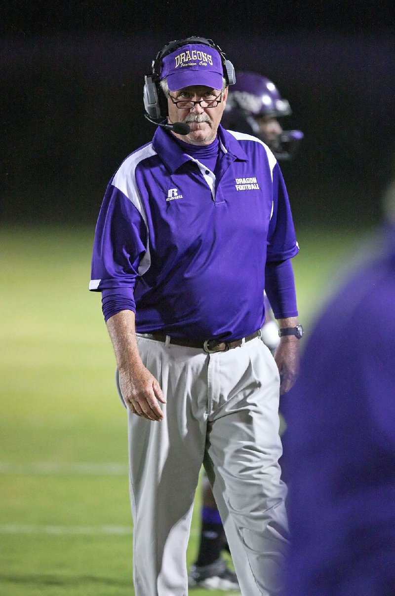 El Dorado News-Times/Michael Orrell

Junction City head football coach David Carpenter walks the sidelines against Woodlawn in the first half at Paul H. Muse Field in Junction City on Friday night. 