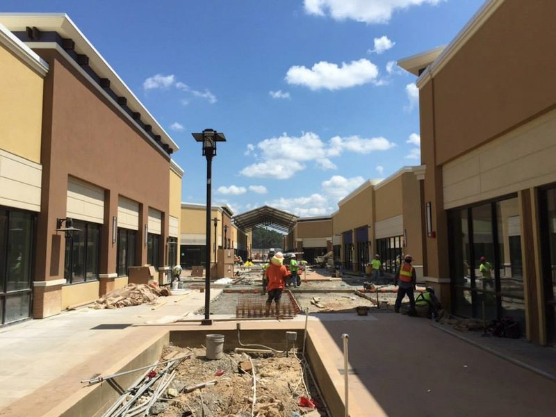 In this August photo, construction on the Outlets of Little Rock continues in preparation for an October opening next to Bass Pro Shops Outdoor World near Interstates 30 and 430.