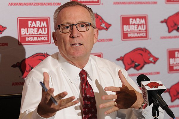 Jeff Long, athletics director for the University of Arkansas, speaks Tuesday, Aug. 25, 2015, in the Raymond Miller Room inside the Broyles Athletic Center on the university campus in Fayetteville.