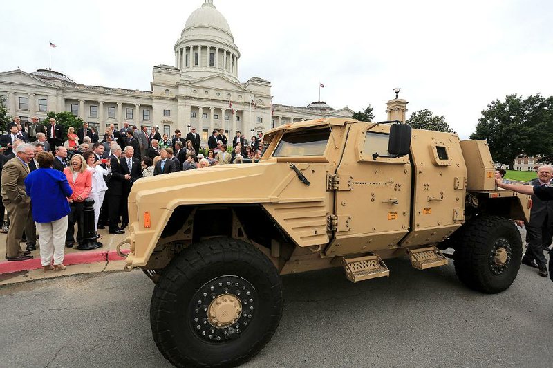 A Lockheed Martin version of the joint light tactical vehicle sits in front of the state Capitol on May 26 as part of a push for $87 million in state funds to back Lockheed Martin’s bid to build the Army vehicle near Camden. The money was approved in a special legislative session, but the contract was awarded Tuesday to a company in Wisconsin.