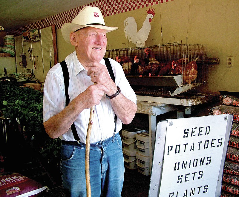 File photograph Fred McKinney in 2010 in the family owned and operated business, Webb Feed and Seed.