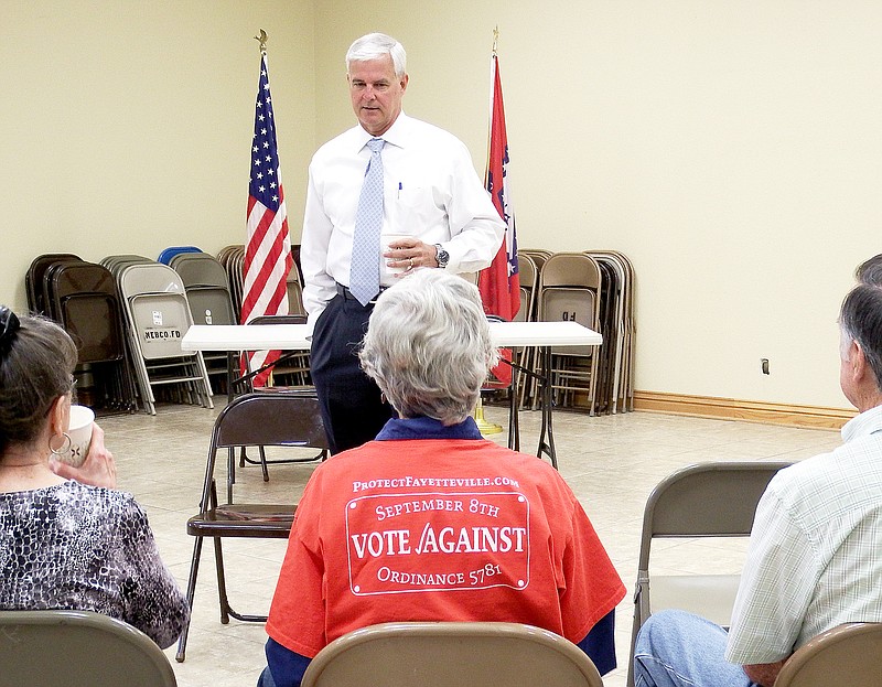 TIMES photograph by Annette Beard More than two dozen people questioned and dialogued with Congressman Steve Womack Tuesday morning in the community room in the Northeast Benton County Volunteer Fire Department Station No. 1.