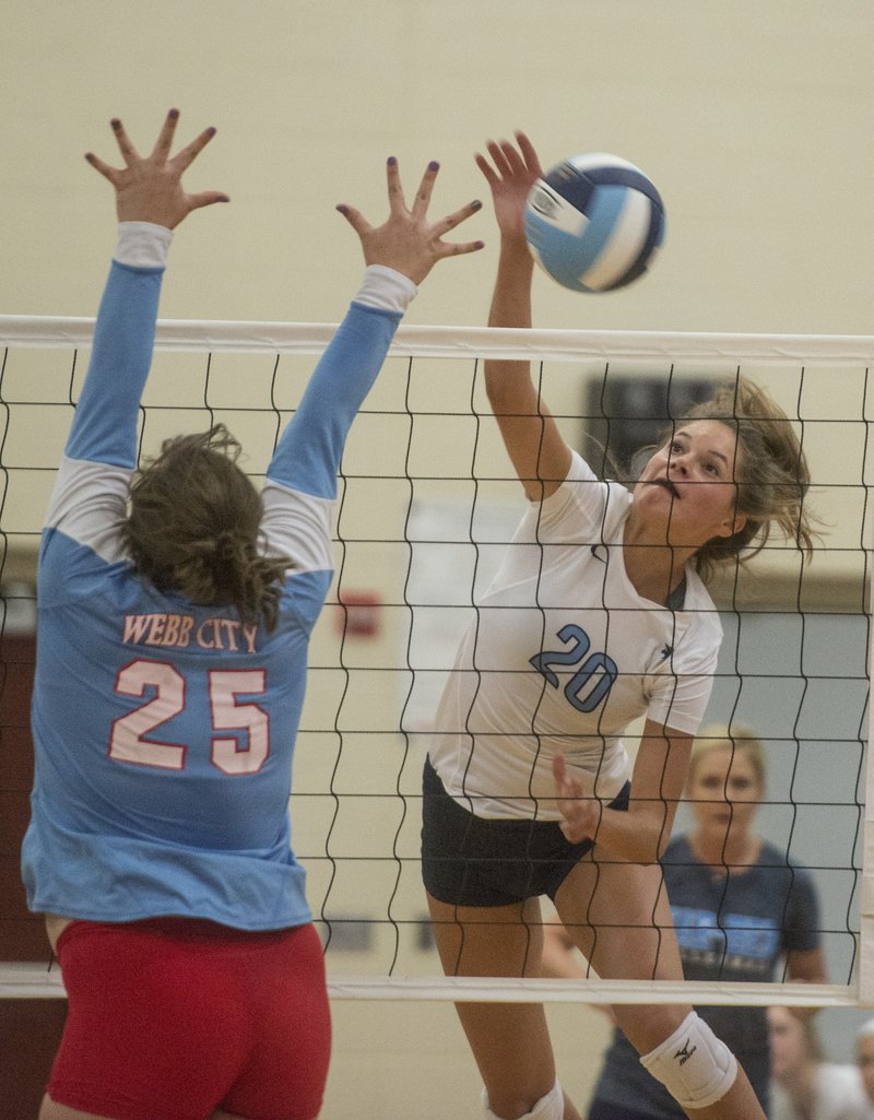 Lauren Thompson (20) of Springdale Har-Ber spikes Tuesday against Webb City, Mo., at Wildcat Arena in Springdale. The Wildcats won 3-0.