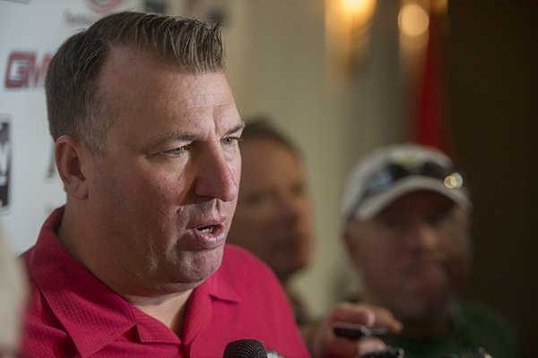 Bret Bielema, head football coach at the University of Arkansas, talks to the media Wednesday, Aug. 26, 2015 before he spoke at the NWA Touchdown Club at Mermaids restaurant in Fayetteville.