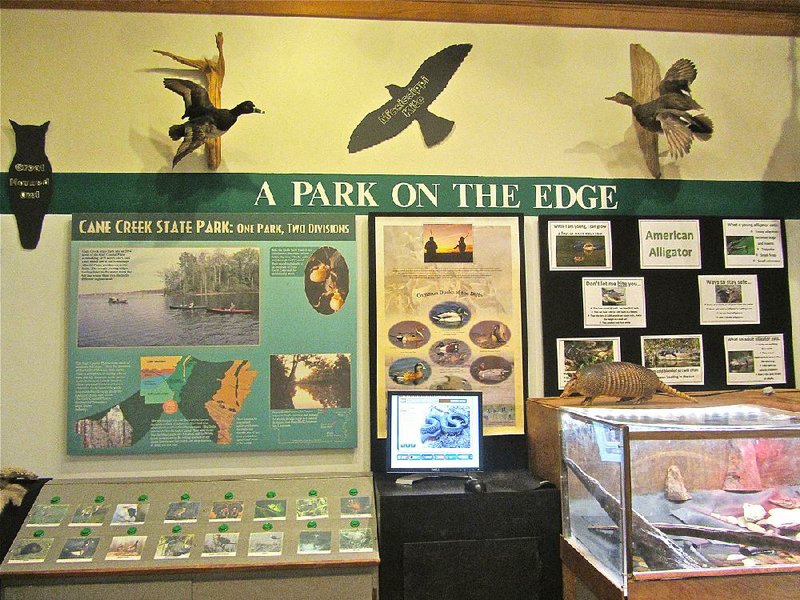 A visitor center exhibit at Cane Creek State Park, 70 miles southeast of Little Rock, highlights its location on the border between two major natural divisions of Arkansas.