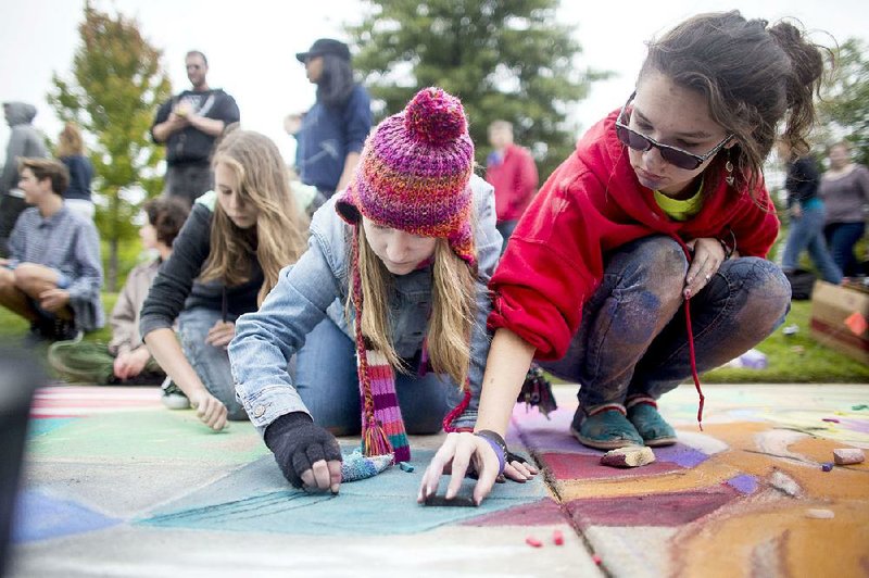 Students, families and groups will give the sidewalks around the Clinton Presidential Center, 1200 President Clinton Ave., a colorful makeover at the 10th annual Thea Paves the Way event, 8 a.m.-noon Sept. 12.