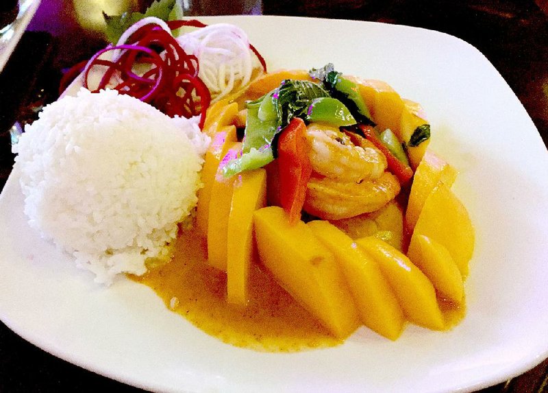 The Bangkok Mango chef special at Zangna Thai Cuisine features shrimp and scallops simmered in a red curry sauce with fresh mango, bell peppers, basil and choice of rice.