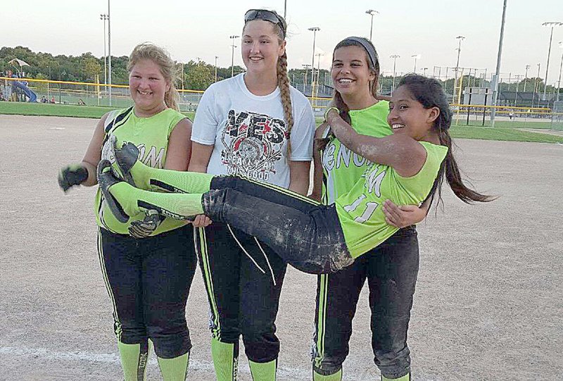 COURTESY PHOTO Venom all-girl team members who were selected as Mo./Kan. All-State players at the recent World Series playoffs at Orlando. Left to right: Lakota Wolf, pitcher; Kassidy White Eagle, short stop; Lacey Rowe, 3rd base; and they are holding Rita Santillan, catcher.