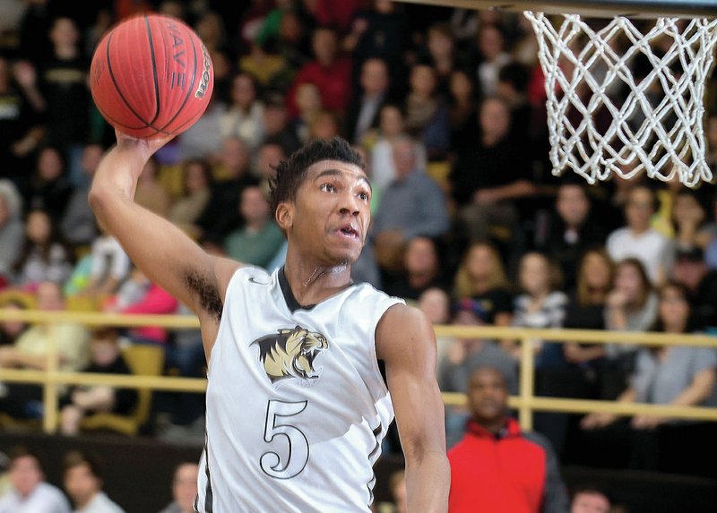 NWA Democrat-Gazette/JASON IVESTER Malik Monk dunks Jan. 13 against Fort Smith Northside in Bentonville.