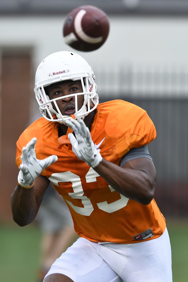 Tennessee safety LaDarrell McNeil catches a pass Aug. 11 during practice in Knoxville, Tenn. Coach Butch Jones said Thursday that McNeil will miss “an extended period of time” due to “neck instability.”