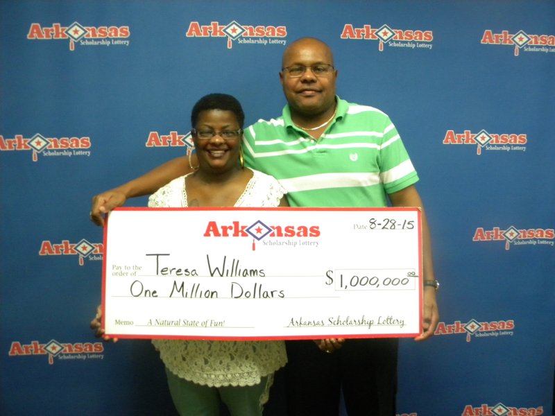 Teresa Williams of Jacksonville poses with her fiancee, Douglas, after she won $1 million in the Arkansas lottery.