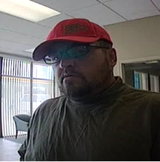 A surveillance image of a Bentonville bank robbery suspect.