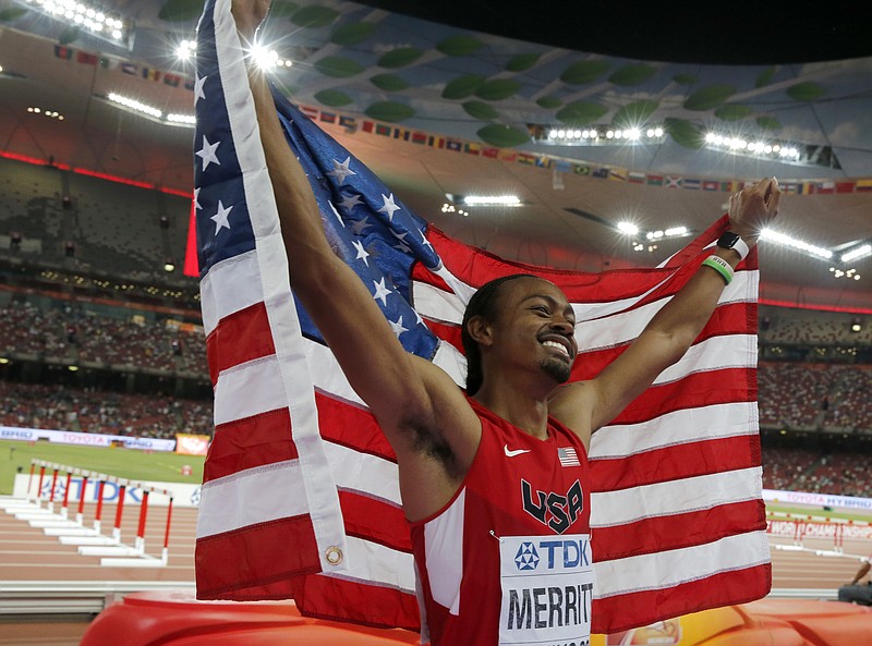 The Associated Press ORDER OF MERRITT: United States' Aries Merritt, bronze, celebrates after the men's 110-meter hurdles final at the world championships Friday at the Bird's Nest in Beijing. Merritt finished third just four days before undergoing a kidney transplant.