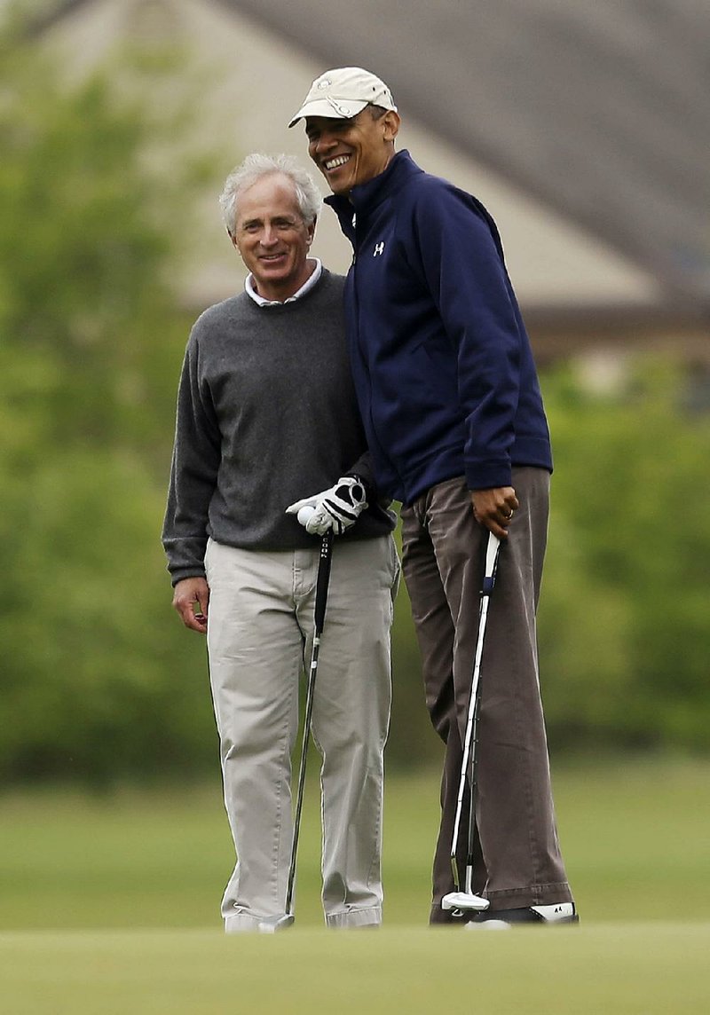 President Barack Obama and U.S. Sen. Bob Corker play golf in May of 2013 at Andrews Air Force Base.