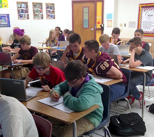 Submitted photo Lake Hamilton Junior High students in Jeff Scott's science classroom worked on metric conversions using Chromebooks. The junior high now has multiple classroom sets of Chromebooks.