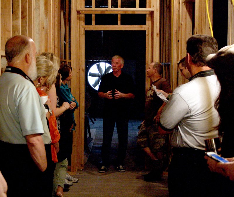 Landon Reeves/Siloam Sunday Bruce Williams is leading a tour on the second floor of the Morris Hotel, a historical building in downtown Siloam Springs, which he owns and is restoring.
