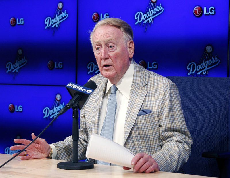 Los Angeles Dodgers Hall of Fame broadcaster Vin Scully announces Saturday in Los Angeles that he will return to broadcast his 67th and final baseball season in 2016.