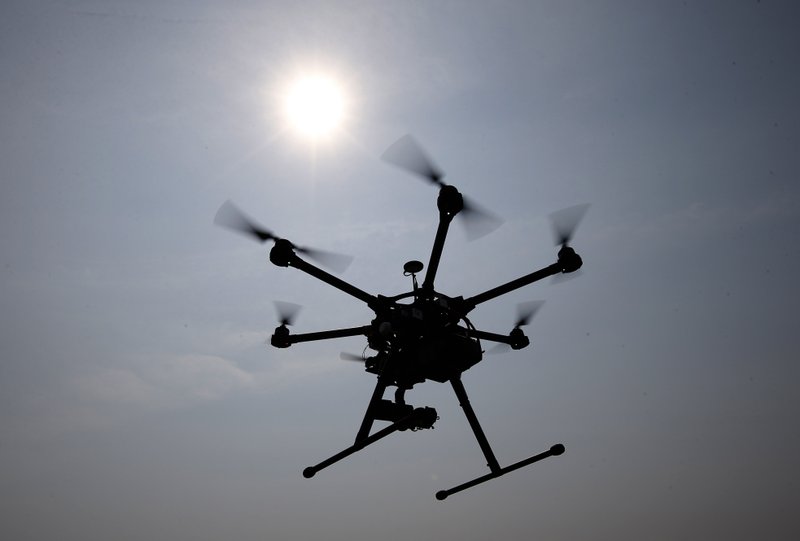 FILE - In this June 11, 2015 file photo, a hexacopter drone is flown in Cordova, Md.
