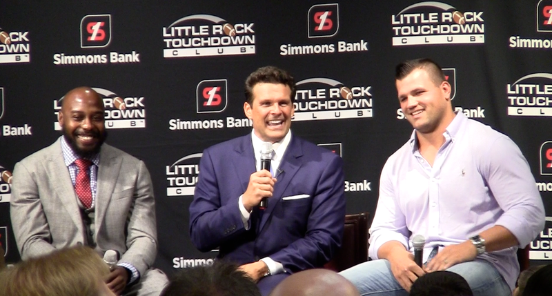 Former Arkansas running backs Felix Jones (left) and Peyton Hillis (right) speak with sports media personality David Bazzel on Monday, Aug. 31, 2015, during a meeting of the Little Rock Touchdown Club at Embassy Suites in Little Rock.