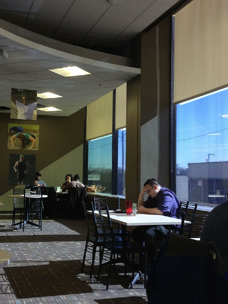 It’s not unusual to see people lunching alone in restaurants such as the Green Leaf Grill, in the Blue Cross and Blue Shield building at 601 S. Gaines St.