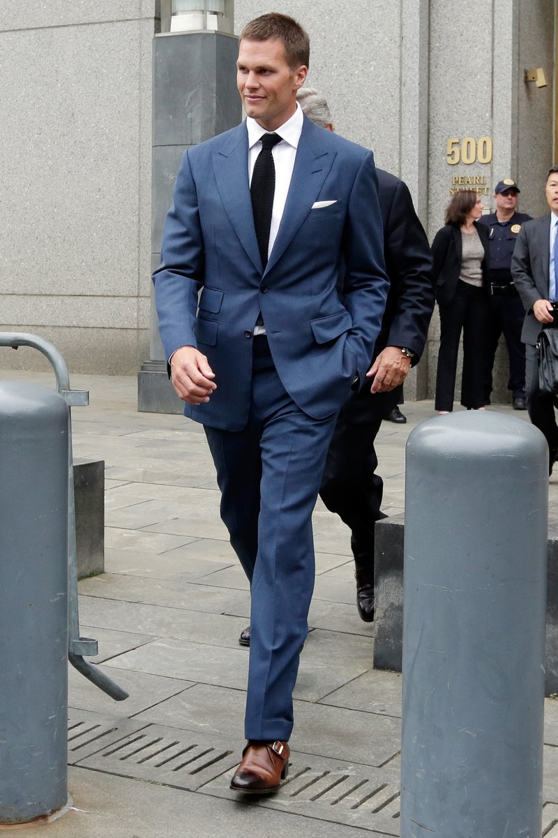 New England Patriots quarterback Tom Brady leaves federal court in New York on Monday. Brady and NFL Commissioner Roger Goodell attended last-minute settlement talks between the NFL and its players union before a judge announced he would decide the dispute over deflated footballs with a ruling in a day or two.