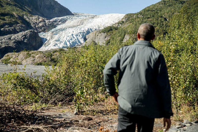 President Barack Obama pauses to view the Exit Glacier in Seward, Alaska, on Tuesday.