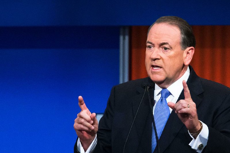Republican presidential candidate and former Arkansas Gov. Mike Huckabee speaks during the first Republican presidential debate at the Quicken Loans Arena Thursday, Aug. 6, 2015, in Cleveland. 