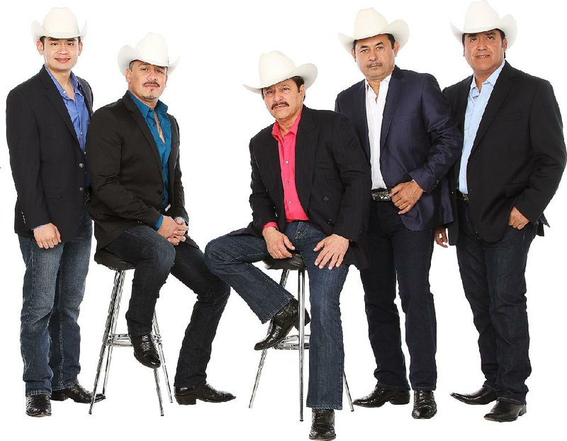 Los Invasores de Nuevo Leon performs Sunday at Magic Springs Water & Theme Park in Hot Springs.
