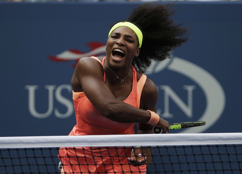 Serena Williams follows through as she returns a shot to Kiki Bertens, of the Netherlands, during the second round of the U.S. Open tennis tournament, Wednesday, Sept. 2, 2015, in New York.