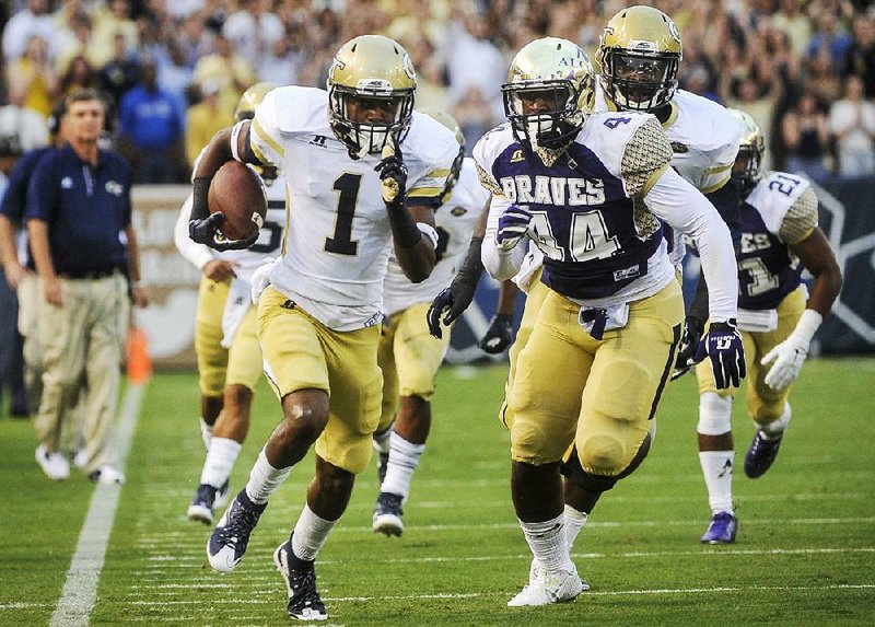 Georgia Tech running back Qua Searcy (1) outruns Alcorn State linebacker Darien Anderson during the first half of Thursday’s game in Atlanta. The 16th-ranked Yellowjackets pounded the Braves 69-6.