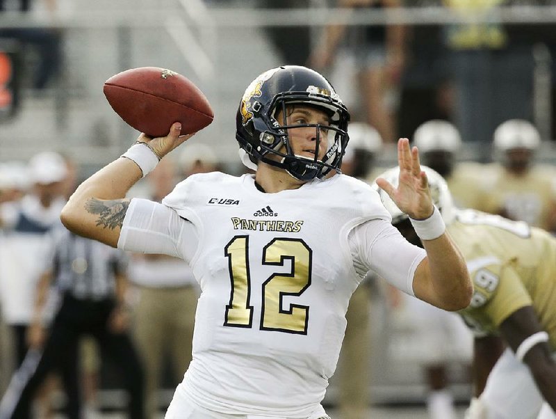 Florida International quarterback Alex McGough completing 29 of 38 passes for 260 yards and a touchdown against Central Florida on Thursday in Orlando, Fla. Florida International won 15-14.
