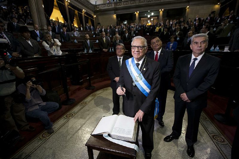 Guatemala’s new president, Alejandro Maldonado, is sworn into office Thursday in Guatemala City. 